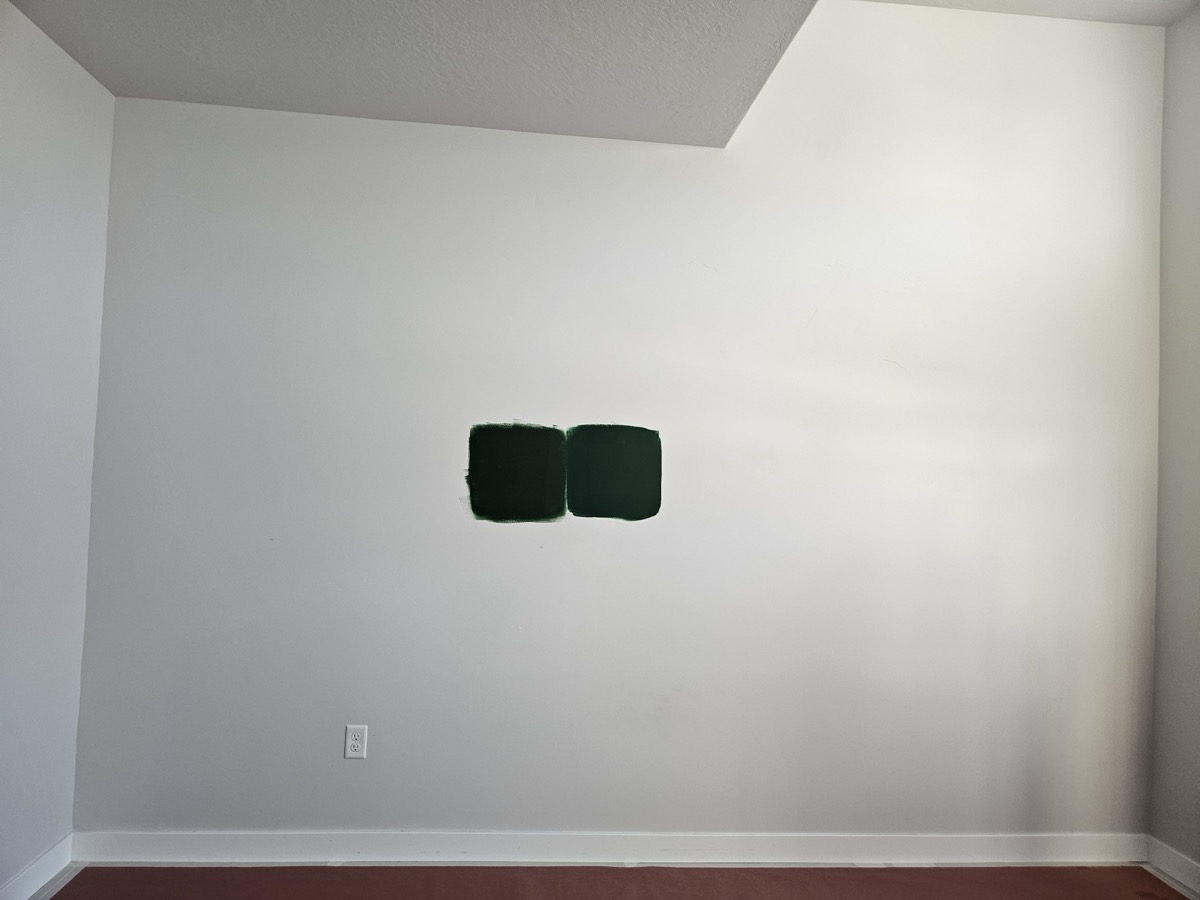 Empty office wall before custom shelving installation