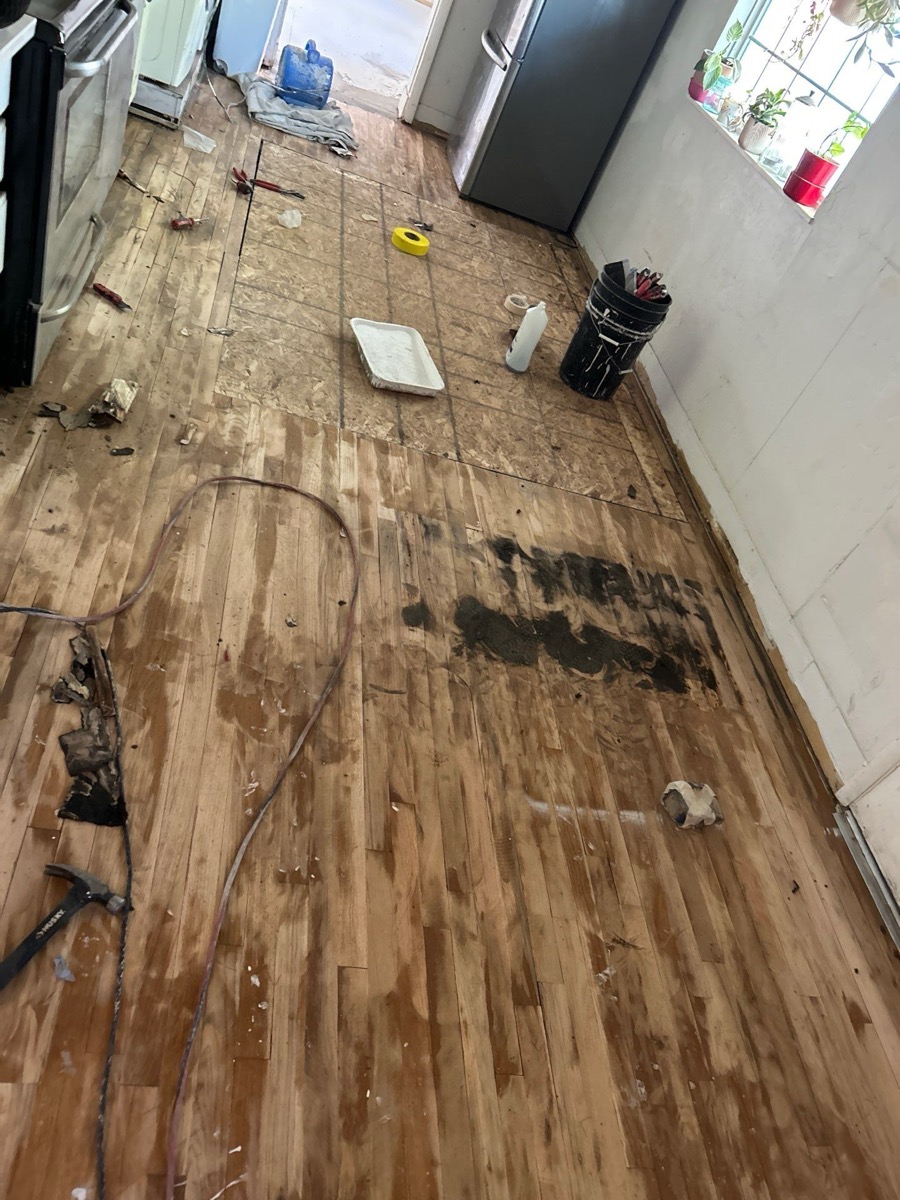 Damaged floor before restoration - view 2